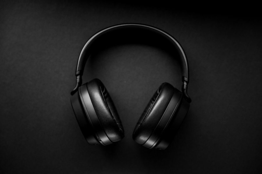 SG-01 Headphones in Graphite on a black surface
