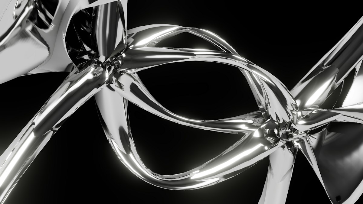 Machined metal object on black